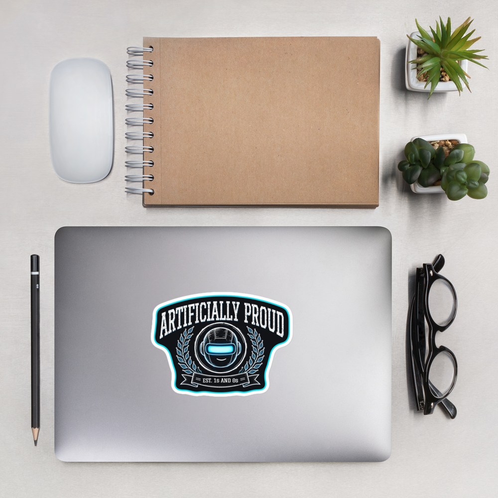 Artificially Proud sticker on a laptop, desk flat lay